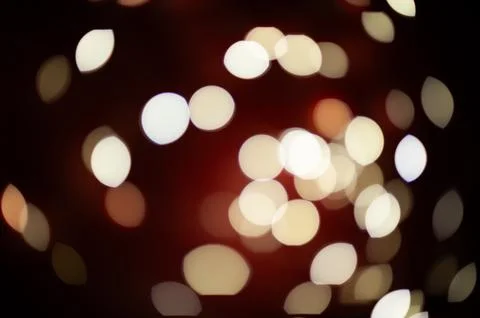 A blurry image of a red background with many white circles Stock Photos