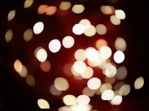 A blurry image of a red background with many white circles Stock Photos