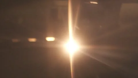A blurry image of a room with a light shining on a table Stock Footage 302457418