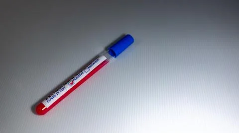 Blurry image of a Sample blood in test tube of Coronavirus (Covid-19). Corona Stock Photos
