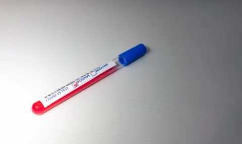 Blurry image of a Sample blood in test tube of Coronavirus (Covid-19). Corona Stock Photos