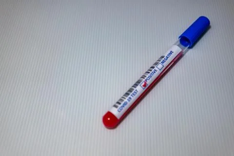 Blurry image of a Sample blood in test tube of Coronavirus (Covid-19). Corona Stock Photos