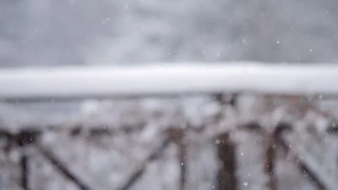 Blurry image of snow falling on a bridge Stock Footage 305625382