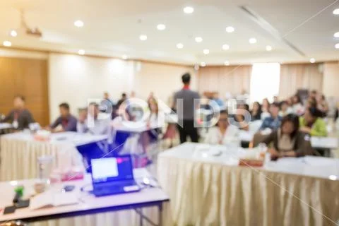 Blurry image. speaker or lecturer with startup business team brainstorming on Stock Photos