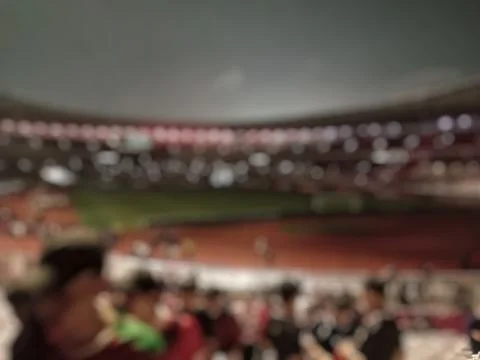 Blurry image of stadium atmosphere after match Stock Photos