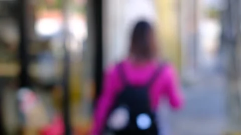 A blurry image of a street with a yellow line on the ground Stock Footage 295340644