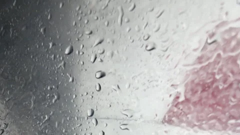 A blurry image of a window with water droplets on it Stock Footage 274031913