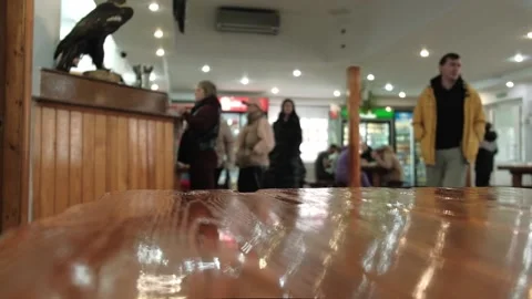 Blurry interior of small cafe with people. unfocused cafe background slow motion Stock Footage 238755952
