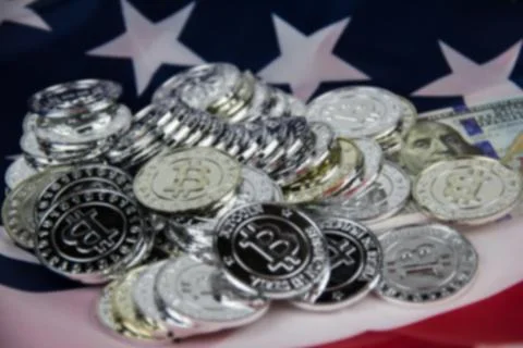 The blurry light design background of silver bitcoin put on USA flag Stock Photos