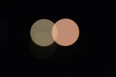 Blurry multicolor light that forms perfect circles and intersects each other Stock Photos