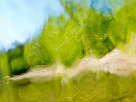 Blurry nature background wavy distorted blue green Stock Photos