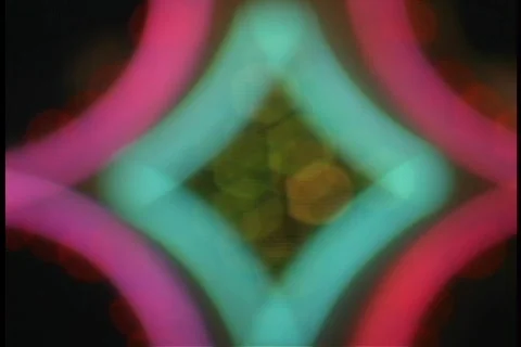Blurry neon dimond shape sign.  Stock Footage 109189