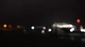 Blurry night illumination of cruise ship moving in harbor 4k or 4k+ Resolution