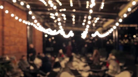 Blurry nighttime cafe Stock Footage 83147012
