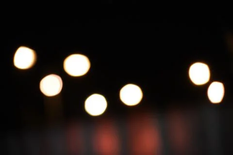 Blurry orange light from the lamp that forms perfect circles Stock Photos