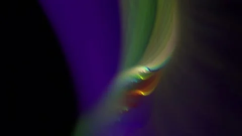 Blurry rainbow colors with glitter revolve in the deep violet space Stock Footage 154514062