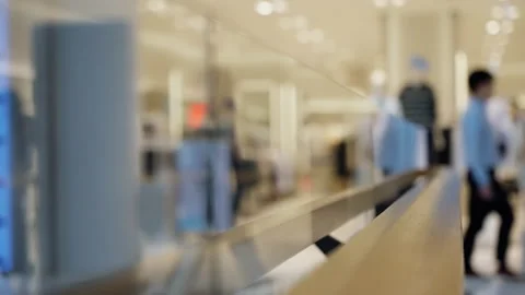 Blurry reflections and abstract perspectives inside a modern, brightly lit Stock Footage 310346939