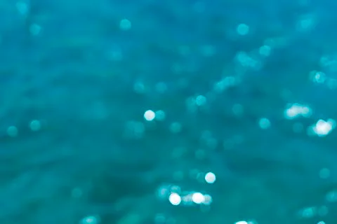 Blurry reflections on ocean surface for backgrounds Stock Photos