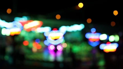 Blurry shot of carousel ride at a faiground at night Stock Footage 120527378