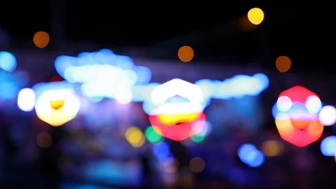 Blurry shot of carousel ride at night with many blinking lights Stock Footage 123071145
