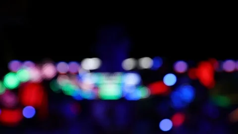 Blurry shot of moving carousel ride at night Stock Footage 123705676