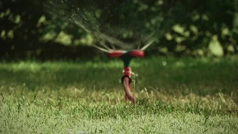 Blurry sprinkler on background Stock Footage 197003612