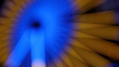 Blurry star light show on a ferris wheel at night Stock Footage 123705602