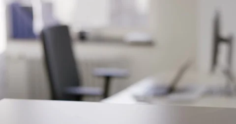 Blurry template of an office work space Stock Footage 105417611