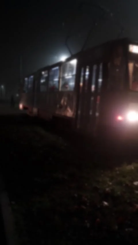 Blurry Tram Driving Through Thick Fog At Night Stock Footage 325224030
