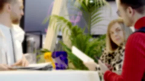 Blurry video of a man talking to clients. Stock Footage 194792518