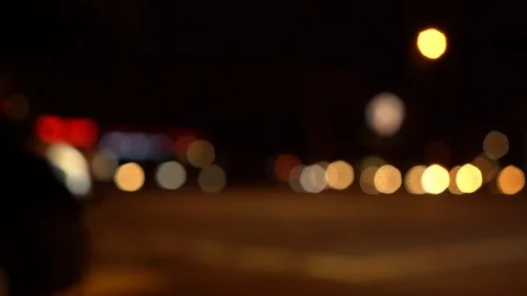Blurry view of city traffic passing by at night in Berlin Stock Footage 123407388