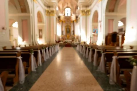 Blurry view of the interior of a beautiful Catholic church Stock Photos
