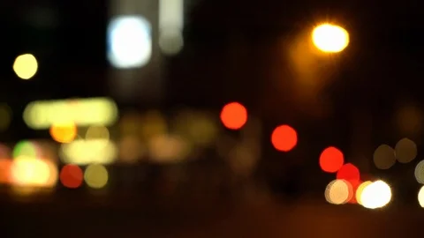Blurry view of intersection and pedestrian crossing at night Stock Footage 122819009