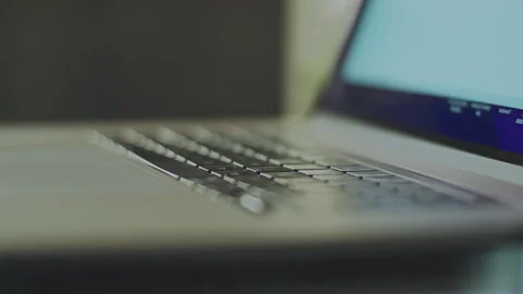 Blurry view of a laptop keyboard Vídeo Stock 234347834