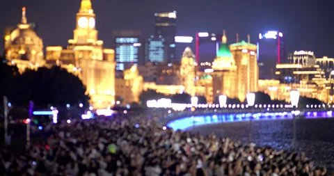 Blurry view of overcrowded Huangpu River embankment at Shanghai skyline at night Stock-Footage 327649629