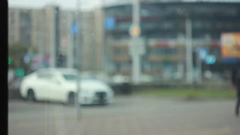 Blurry view through the window during the day in the city Stock Footage 142930293