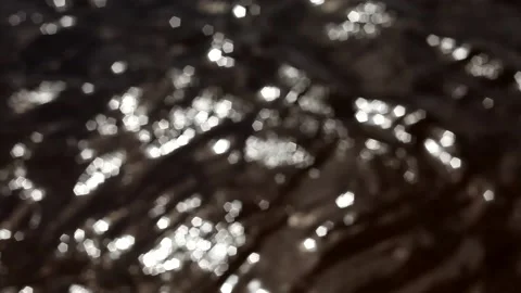 Blurry waves on the surface of the river. Video stock 229461421