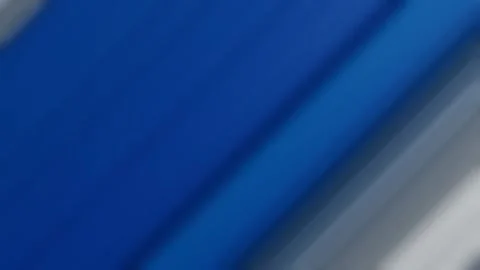 Blurry white blue stripes moving fast. abstract background. 3d render looped ani Stock Footage 311764537