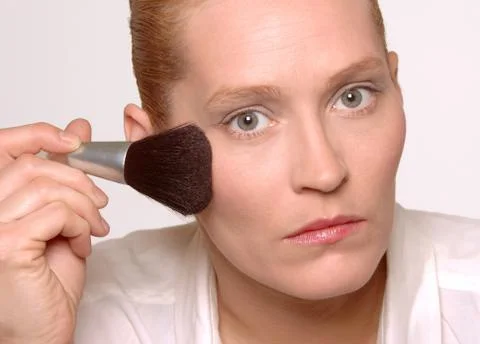 Blush Brushing Headshot Foto stock