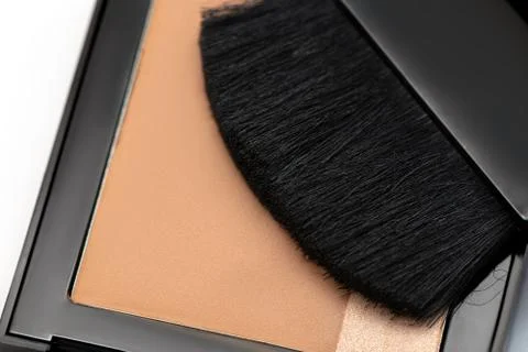 Blush makeup on a white background, close up. Stock Photos