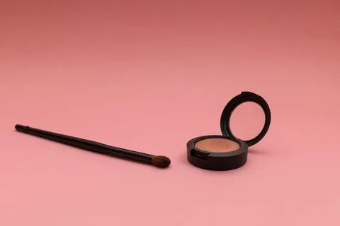 Blush on a pink background, object shot Stock Photos