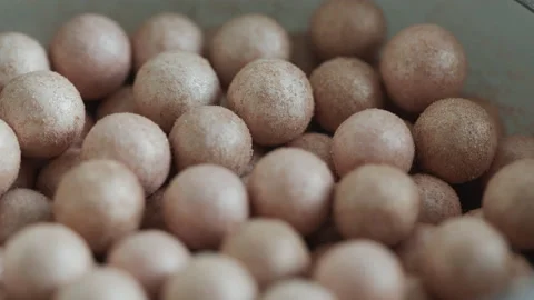 Blusher balls in a box 4K pulling focus video Stock Footage 169745745