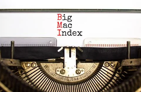 BMI big mac index symbol. Concept words BMI big mac index typed on retro ol.. Stock Photos