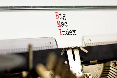BMI big mac index symbol. Concept words BMI big mac index typed on retro ol.. Stock Photos