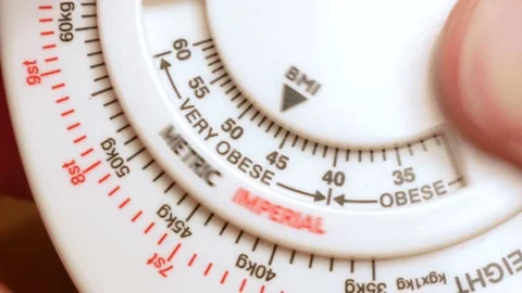 BMI indicator high, arrow showing very obese mark, unhealthy obesity problem Stock Footage 154899682