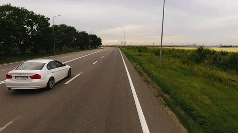 Bmw Driving Through the track At Sunset Stock Footage 91662531