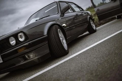 Bmw e30 classic car parked on asphalt road Stock Photos