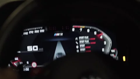 Bmw m drive mode selecting on digital dashboard Stock Footage 330887486