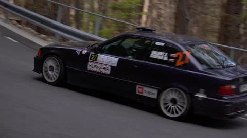 BMW M3 E36 rally car is speeding along a narrow mountain road Stock Footage 244739893