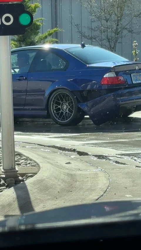 BMW M3 Rear Bumper Tears Off at Car Wash, Vancouver, Washington, USA - 09 Apr 20 Stock Footage 332864797